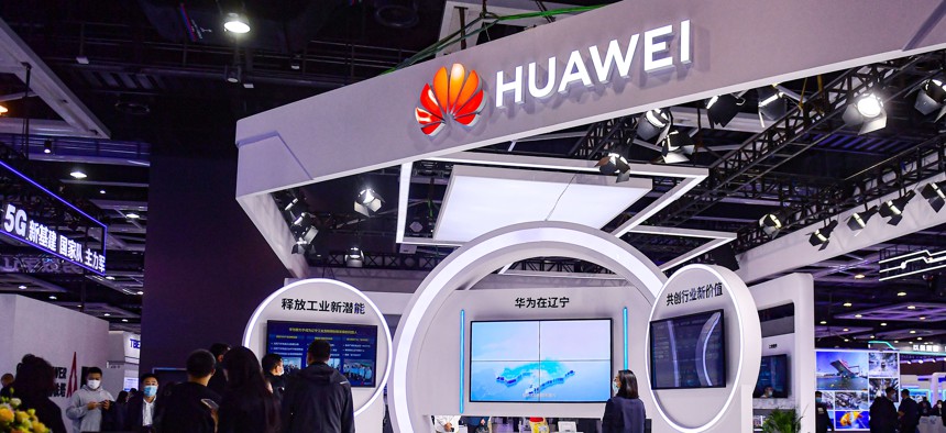 SHENYANG, CHINA - NOVEMBER 07: People visit Huawei booth during an exhibition of the 2022 Global Industrial Internet Conference on November 7, 2022 in Shenyang, Liaoning Province of China. (Photo by VCG/VCG via Getty Images)